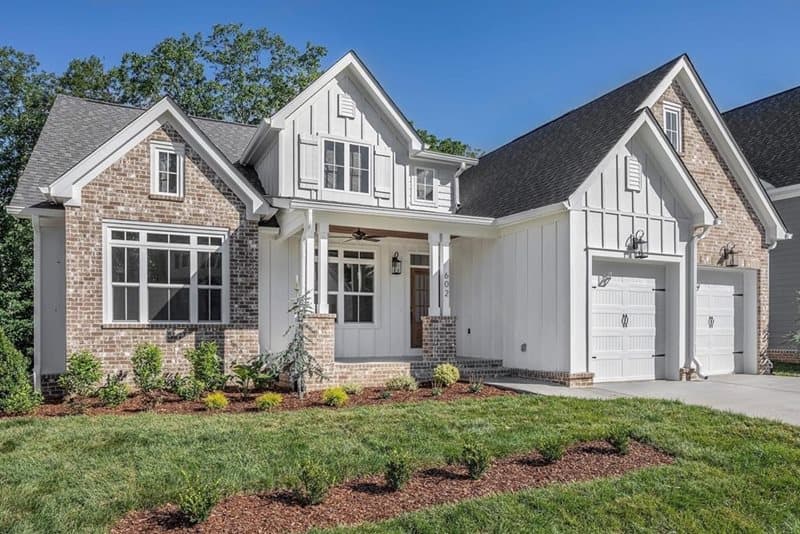 Key Steps for Designing Your Dream Home:  Home clad in Arctic White Board and Batten and pale brick Home clad in Arctic White Board and Batten and pale brick