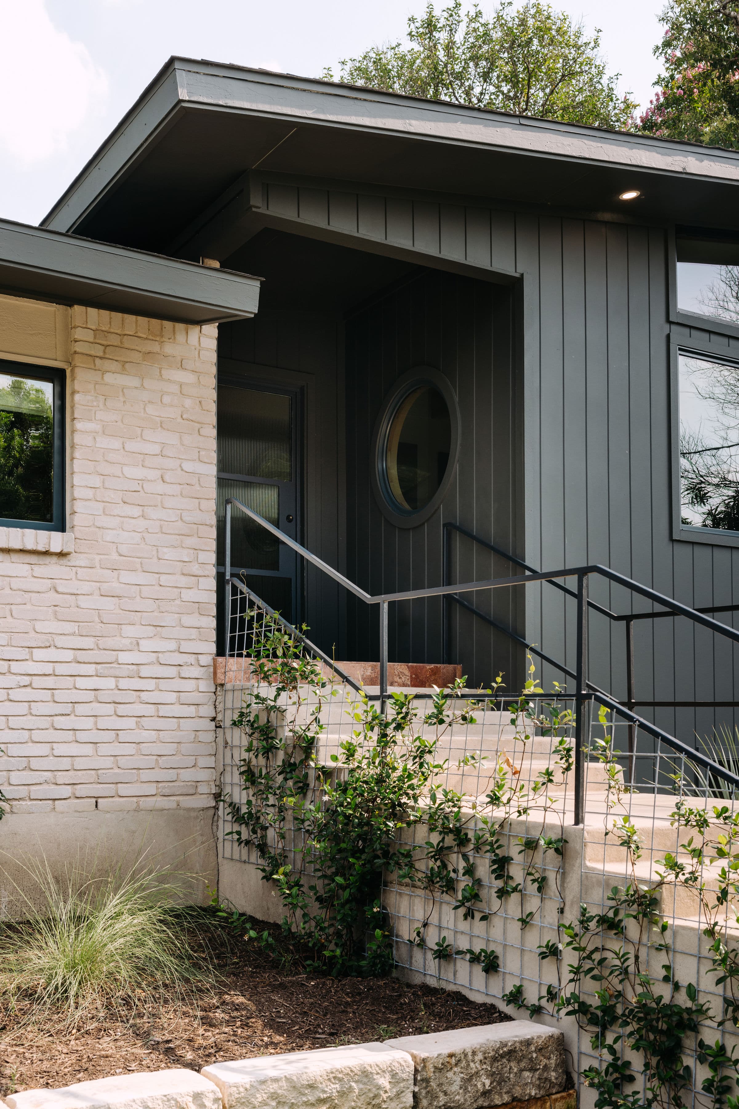 Kim Wolfe front door and walkway featuring Hardie® Artisan® V-Groove installed vertically Kim Wolfe front door and walkway featuring Hardie® Artisan® V-Groove installed vertically