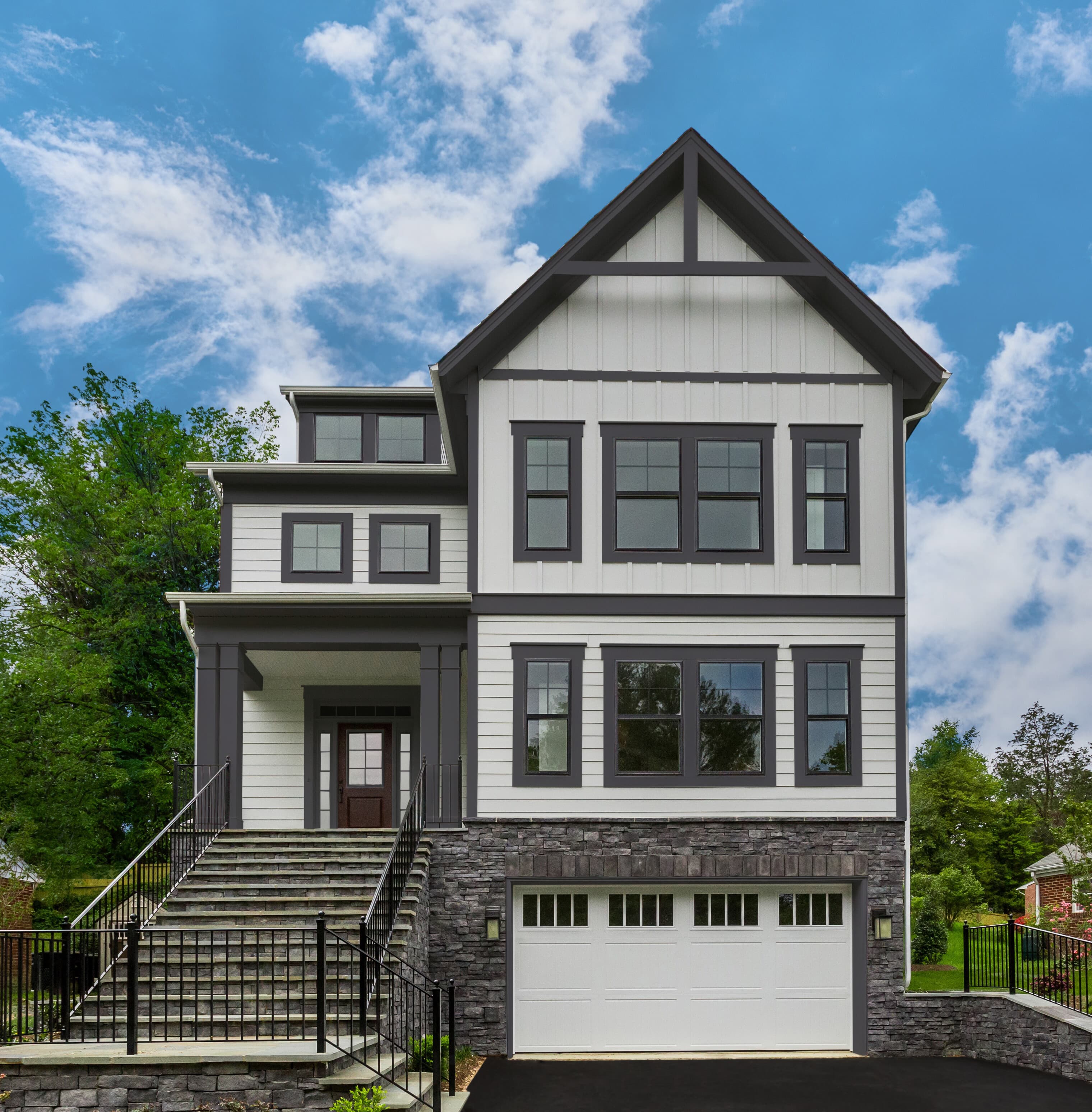 Selecting siding and trim for a whole house re-side: a white house clad in Midnight Black trim A white house clad in Midnight Black Hardie Trim
